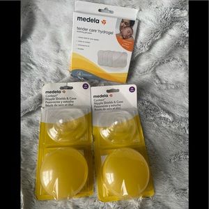 Medela  nipple shield set with medela soothing pads